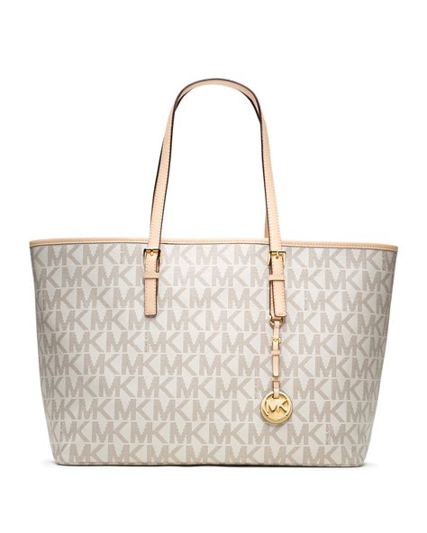 michael kors handbag jet set medium multifunction travel tote luggage|Michael Kors woven leather bag.